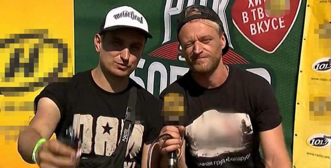 State-run TV channel blurs white-red-white flag on musician's T-shirt