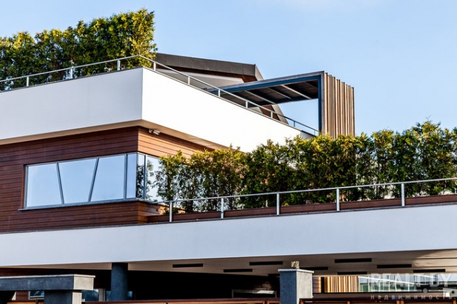 Это точно в Беларуси? Под Минском построили дико крутые коттеджи