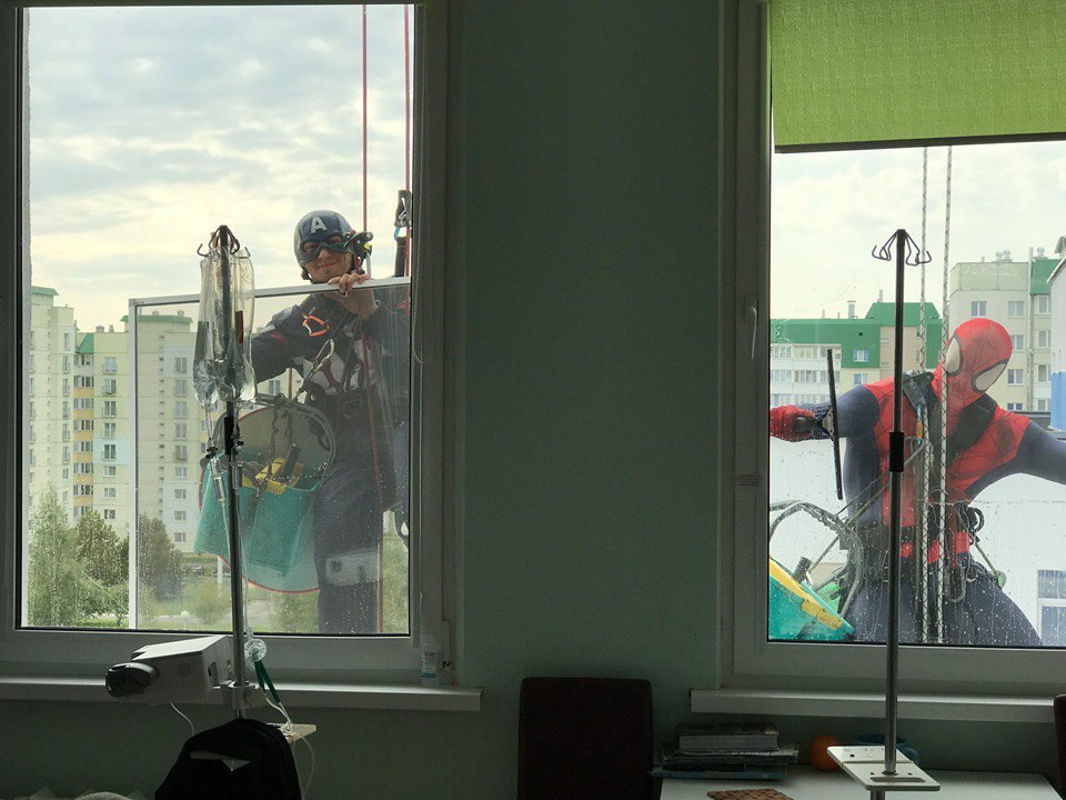 Window Washers Dress Up As Superheroes To Surprise Kids With Cancer