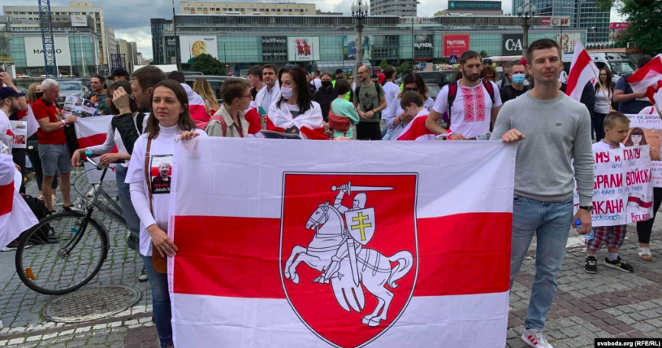 Marches In Warsaw, Kyiv Protest Repression In Belarus On Eve Of Election Anniversary